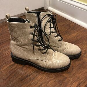 Stylish tan boots with black laces